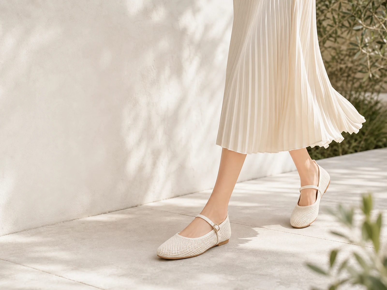Fashion model wearing ivory knit Mary Jane flats for private-label footwear development